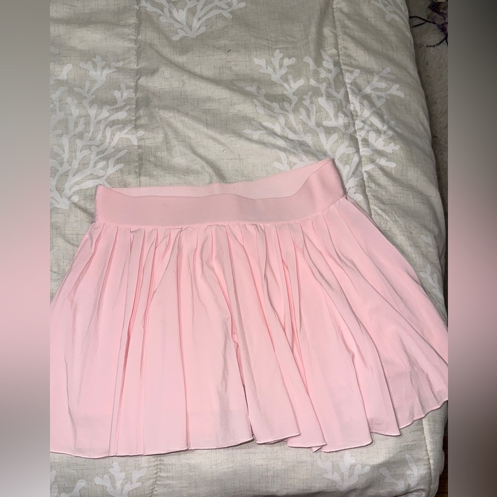 Aritzia primrose Pink TNA tennis skirt, size M